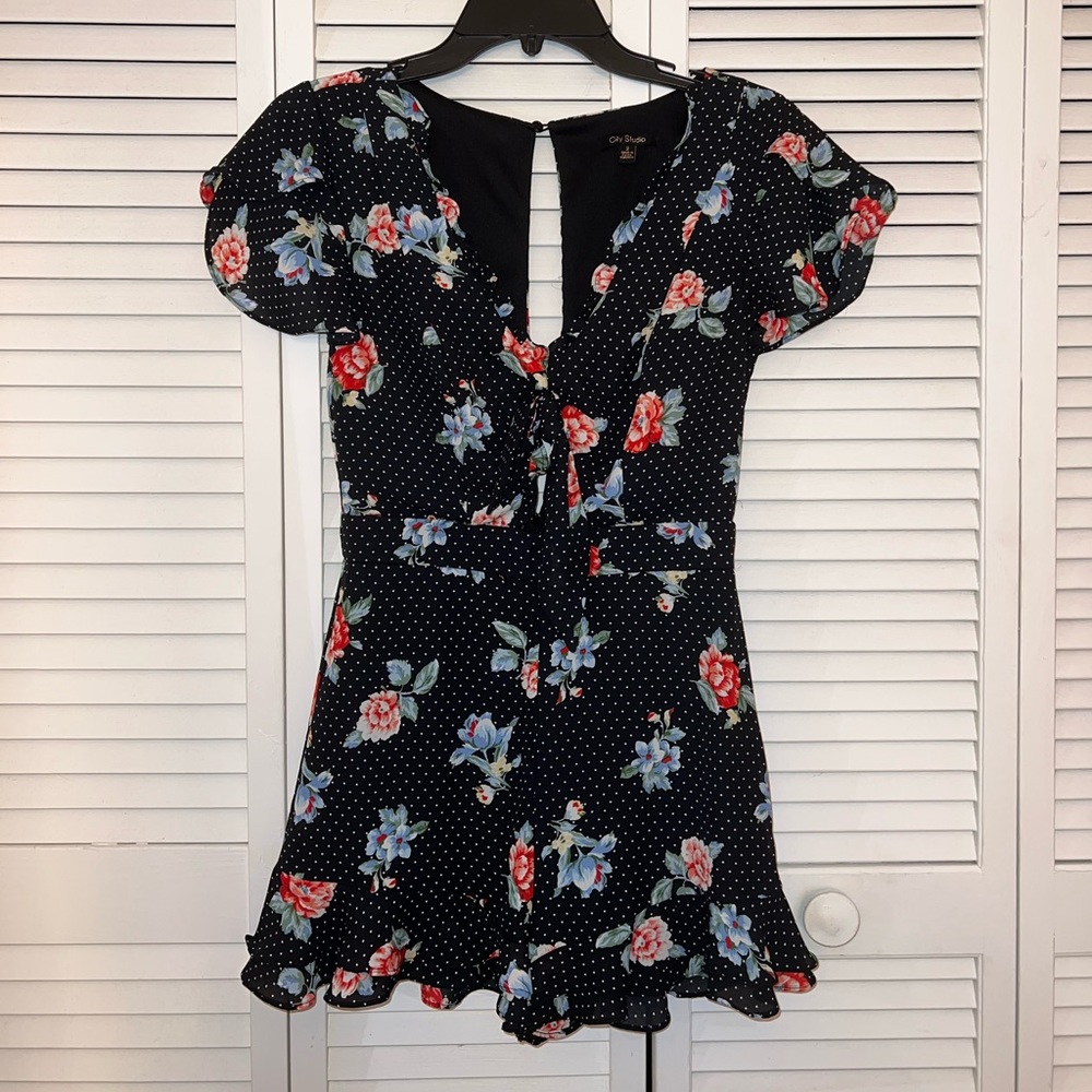 Beautiful backless romper from Dillard’s